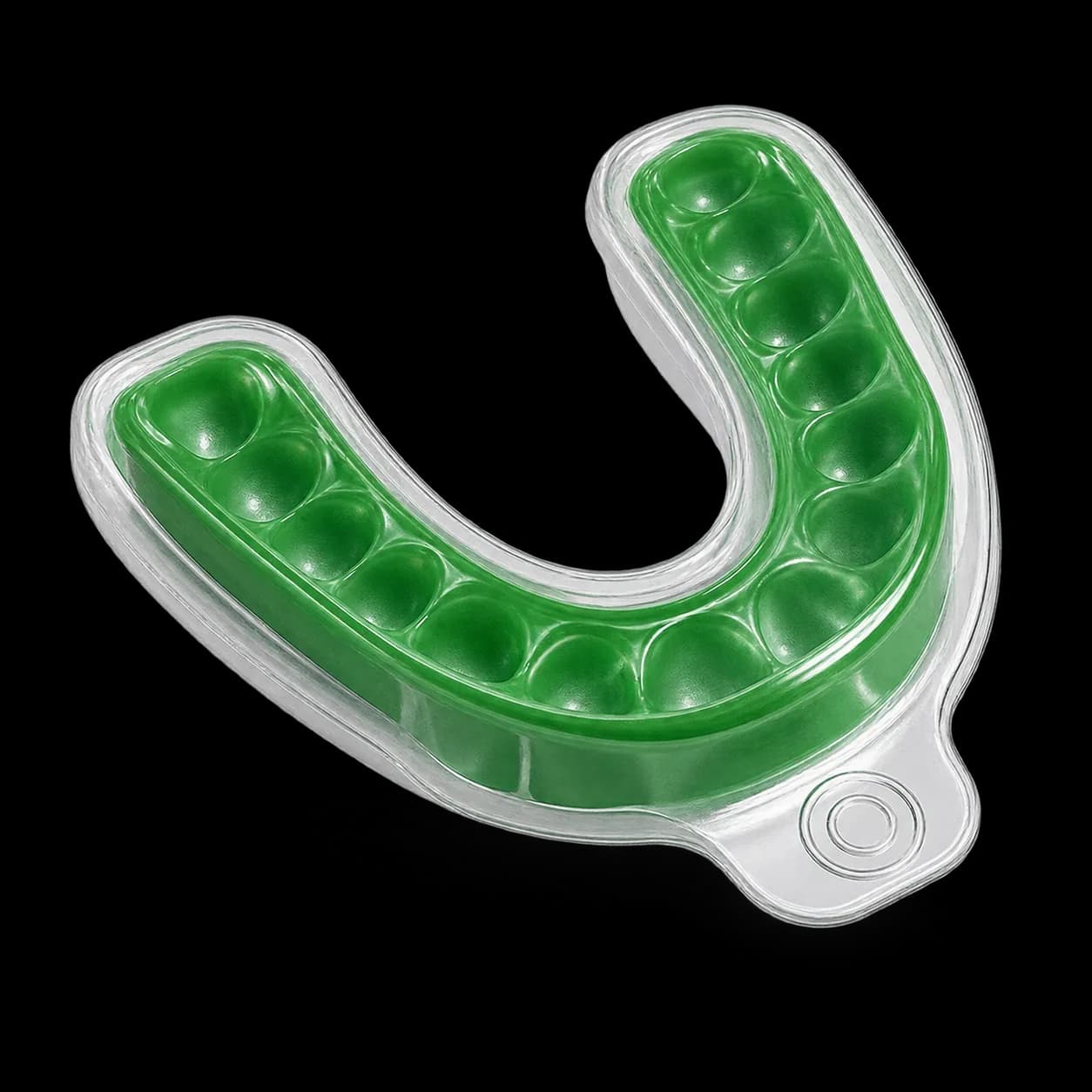 A transparent case holding a green whitening tray